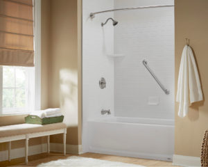 New tub/shower combination with angled grab bar and stainless steel hardware. Beige bathroom walls with white crown molding