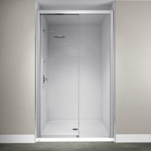 White bathroom with glass door and walk-in showers